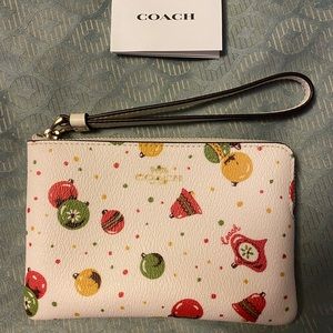 Coach wristlet; chalk color, super sleek for hands free Christmas shopping!!